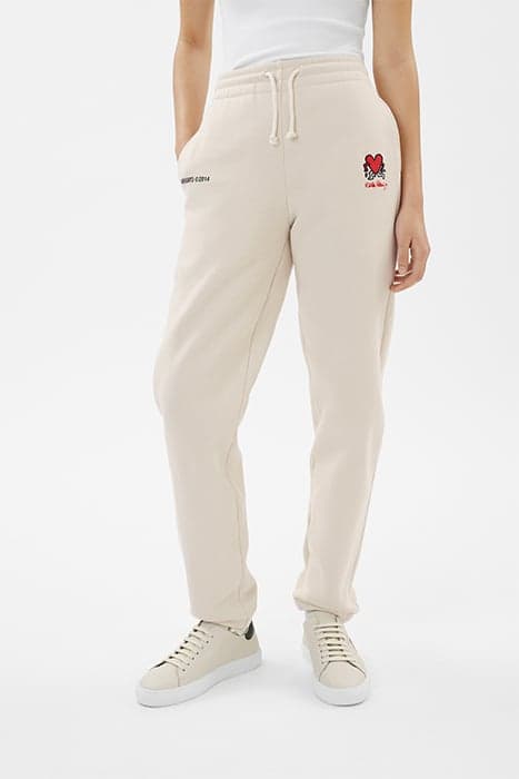 KEITH HARING SWEATPANTS PALE BEIGE by Axel Arigato