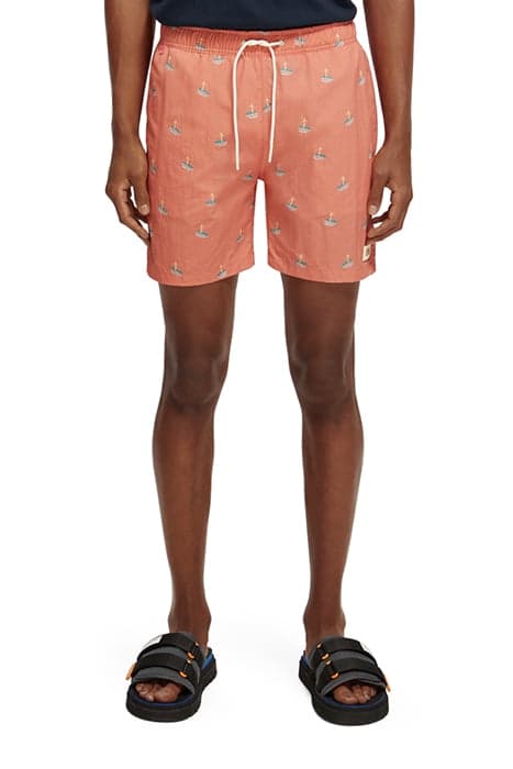 MID LENGTH - MINI PRINTED SWIMSHORT FLAMINGO SURFER AOP by Scotch & Soda